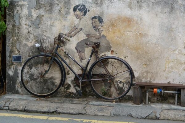 Things to do in Penang Street Art kids on the bike bucket list